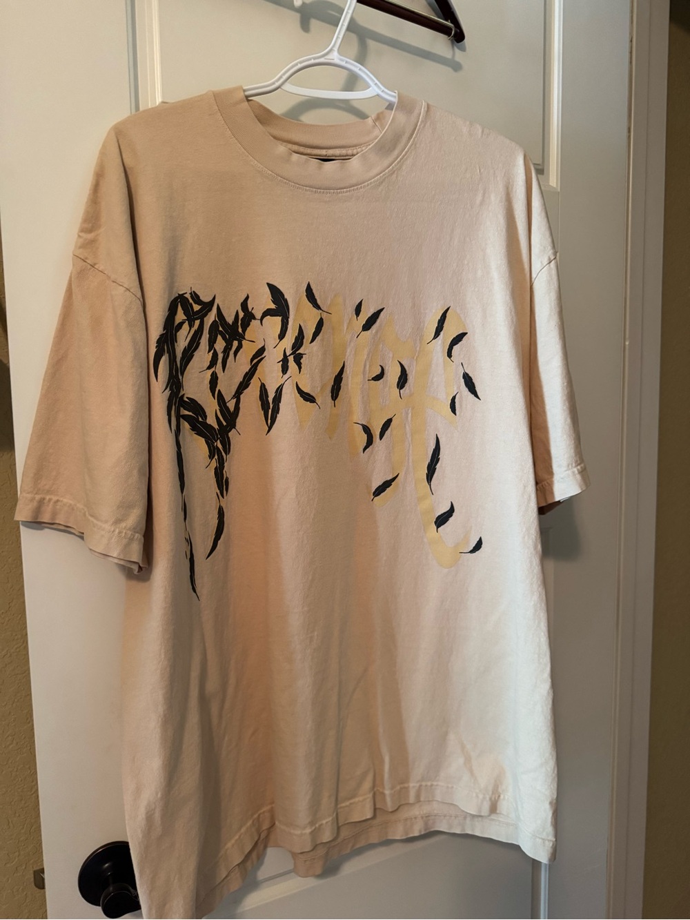 Revenge Clothing Beige Tee with Black & Yellow Graphic